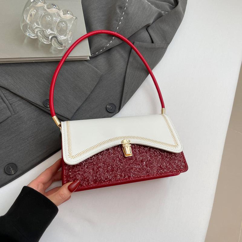 Damen neue Damentaschen sind leichter Luxus und vielseitig, kontrastierende Farben, hochwertiges Temperament und Aussehen, tragbare Schulter-Achseltasche.