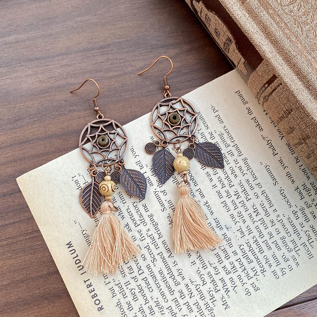 Kolczyki z zawieszką w kształcie muszli w stylu retro etnicznym, modne, z osobowością, niszowe, temperamentne, kolczyki o wykwintnym designie