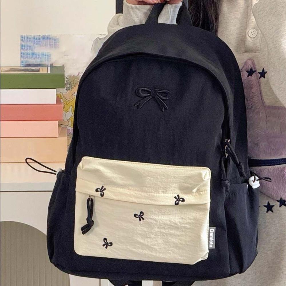 Mochila de lona con lazo Mochila casual bordada para estudiantes Bolso escolar Mochila deportiva de poliéster de color contrastante de gran capacidad