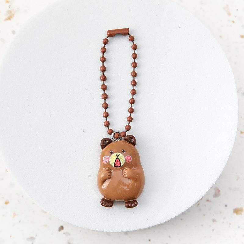 

Милый мультяшный брелок для наушников с медвежонком, автомобильные брелки для телефона, подвески для ключей, брелок для рюкзака, украшение, подарки для пары