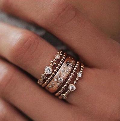 Rose Gold Can Be Stacked On a Set of Five Diamond Rings