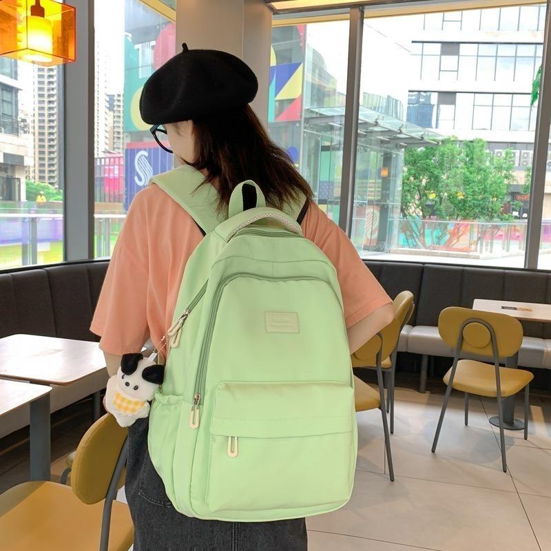 Solid color female Harajuku backpack, campus style, junior high school, high school student schoolbag, female simple large-capacity backpack
