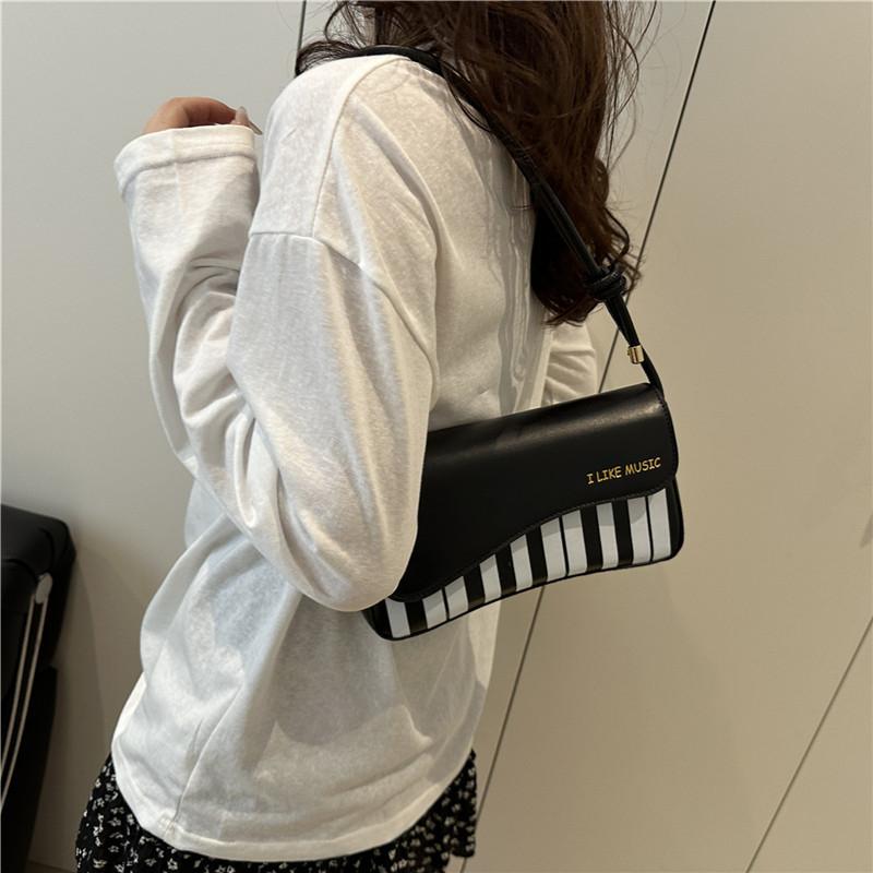 Fashion small square bag women's 2025 summer new piano music note personalized shoulder bag messenger bag sweet portable women's bag