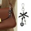 Unique Alloy Bowknot Heart Crucifix Keychain Elegant Key Decoration Religious Symbol Keyring Accessory for Women