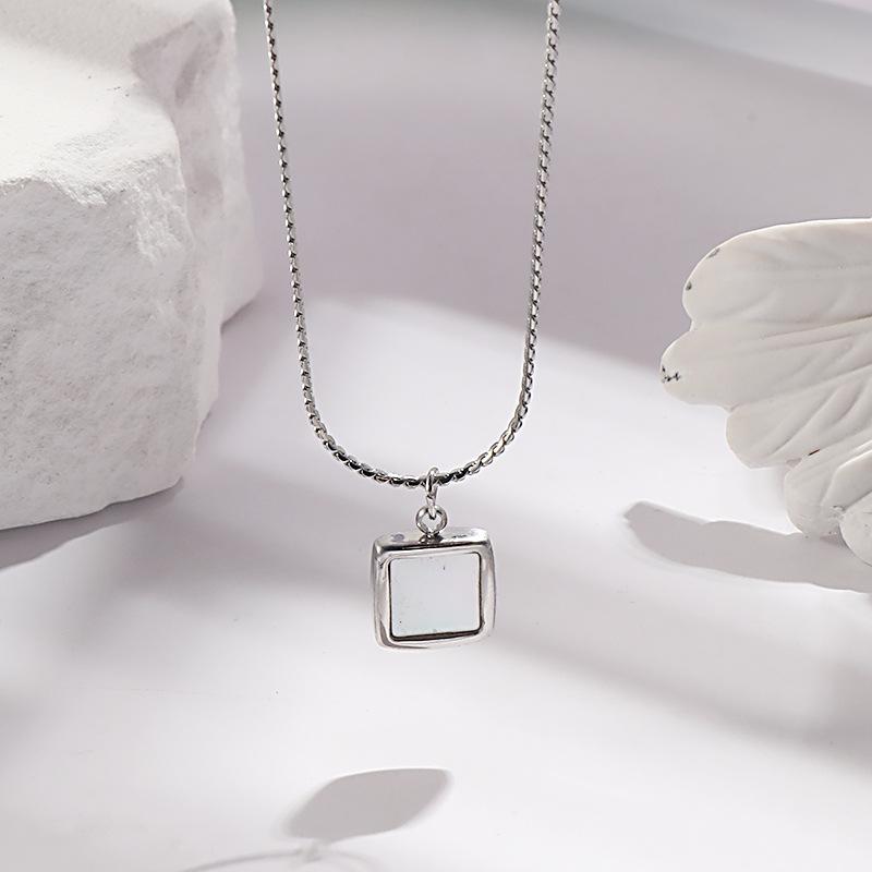 

Ожерелье из титановой стали с белыми таблетками Mother