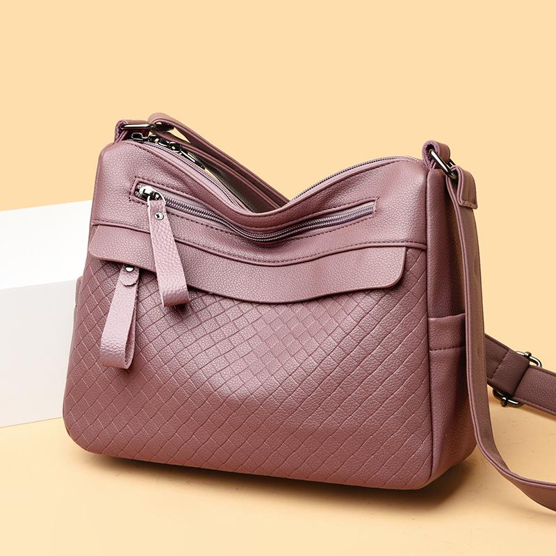 

Жіноча повсякденна багатошарова сумка через плече середнього віку великої місткості фіолетовий