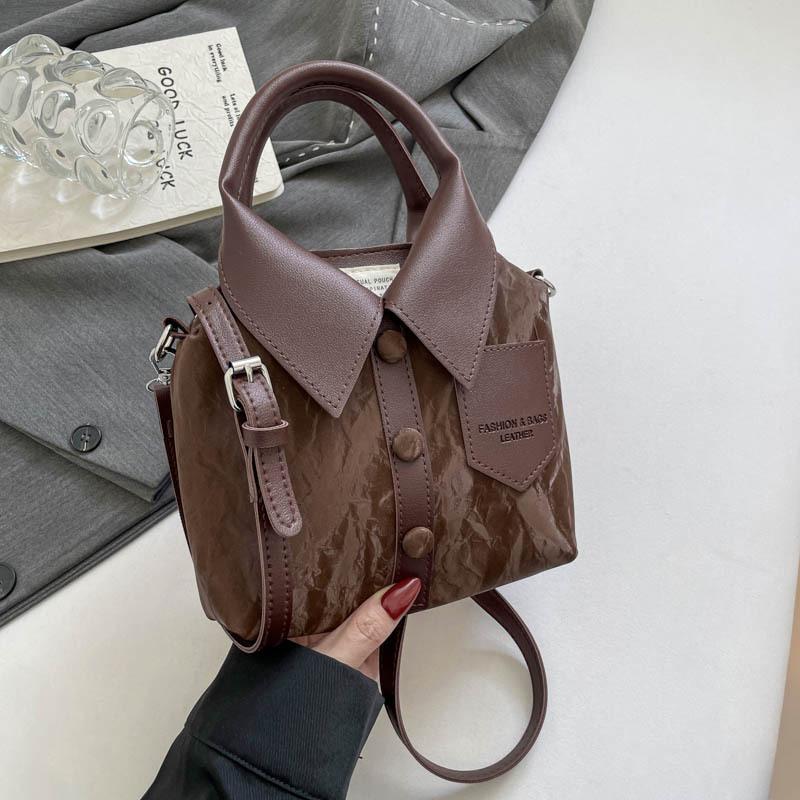 

Korean niche personalized design handbag bag women s new fashion casual shirt bag 2025 simple trendy messenger bag