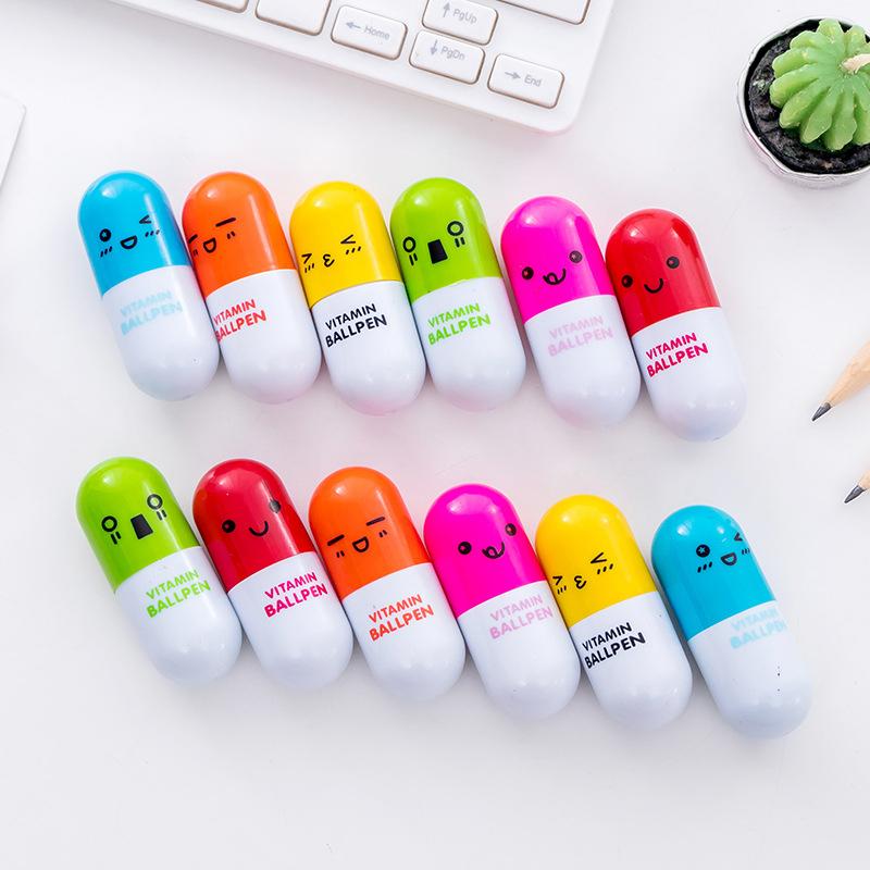 6Pcs Cute Smiling Face Pill Ball Point Pen Novelty Stationery Telescopic Capsule