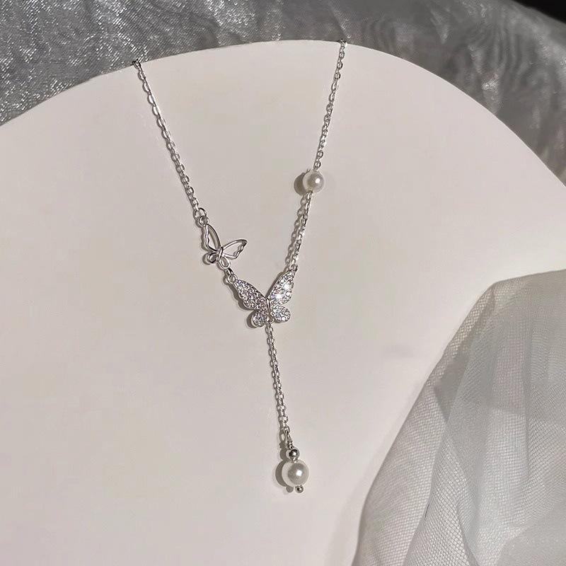 Elegant Pearl & Butterfly Tassel Necklace - 2024 Trendy High-End Luxury Women's Accessory