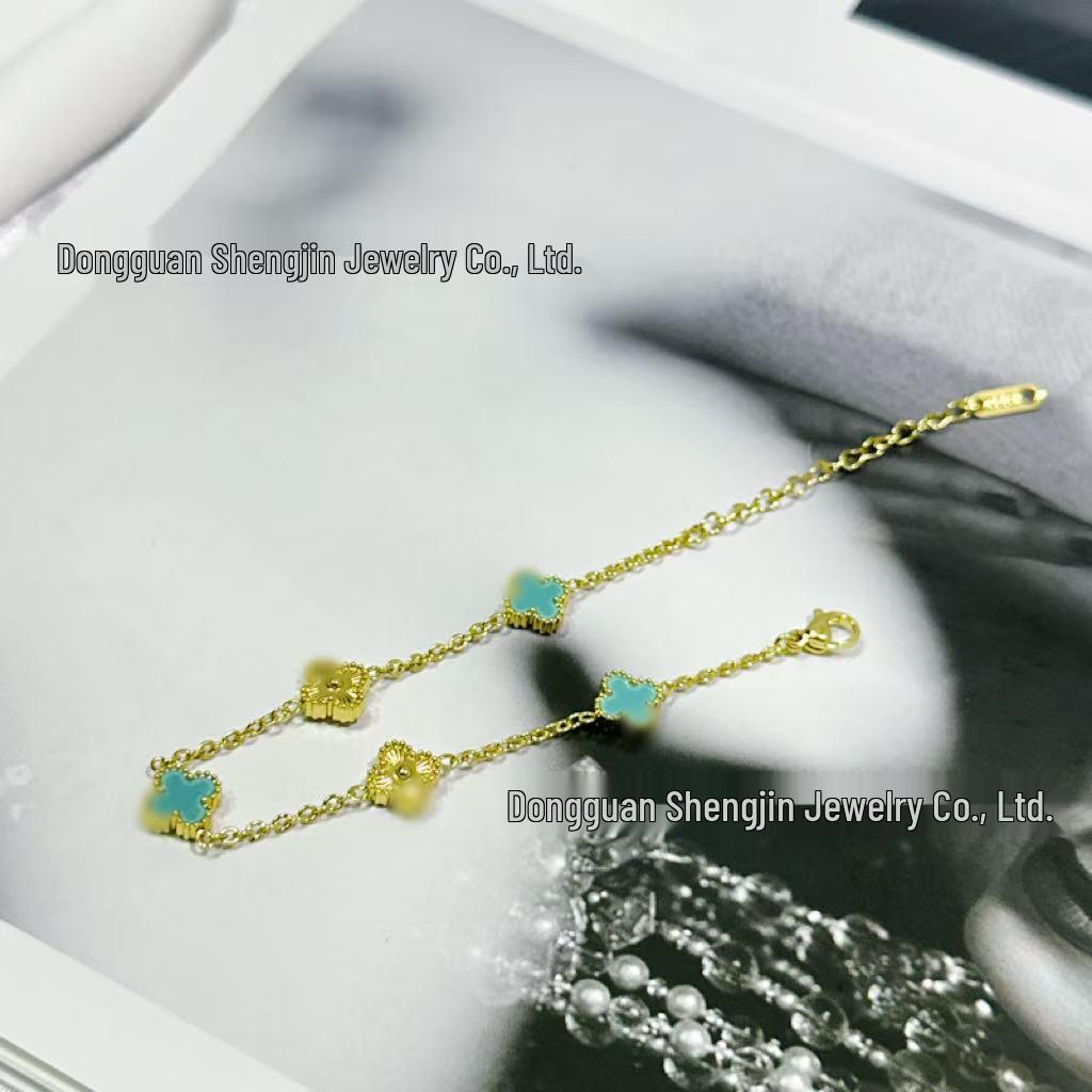Exquisites goldenes Mini-Armband mit vierblättrigem Kleeblatt für Damen - Trendiger Laserschnittschmuck 18K Intracranial Vacuum gray