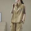 T-shirt Casual Versatile alla Moda con Zip e Collo Alto per Donna Completo Trendy con Pantaloncini di Alta Gamma