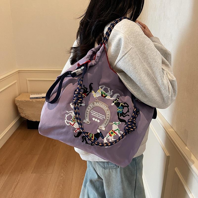 Literary small fresh embroidery pony contrasting color large capacity women's armpit bag new women's shoulder messenger bag
