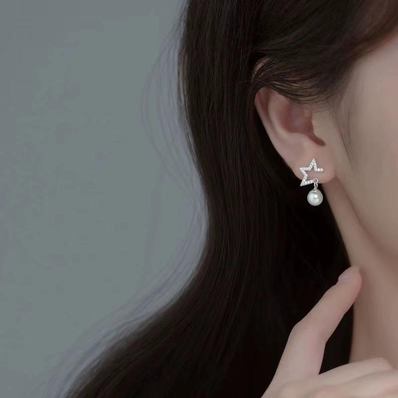 

Diamond-Studded Star & Pearl Earrings for Women - Trendy Beaded Design.