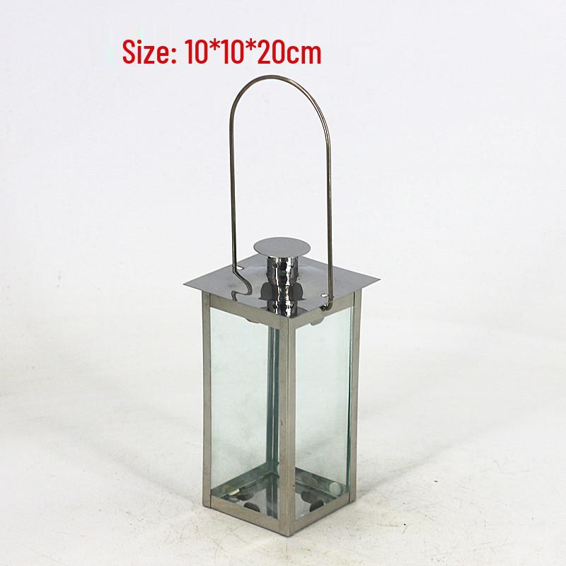 

Европейский стиль Золотой фонарь из нержавеющей стали Подсвечник: Ветрозащитное стеклянное украшение для уличного декора.