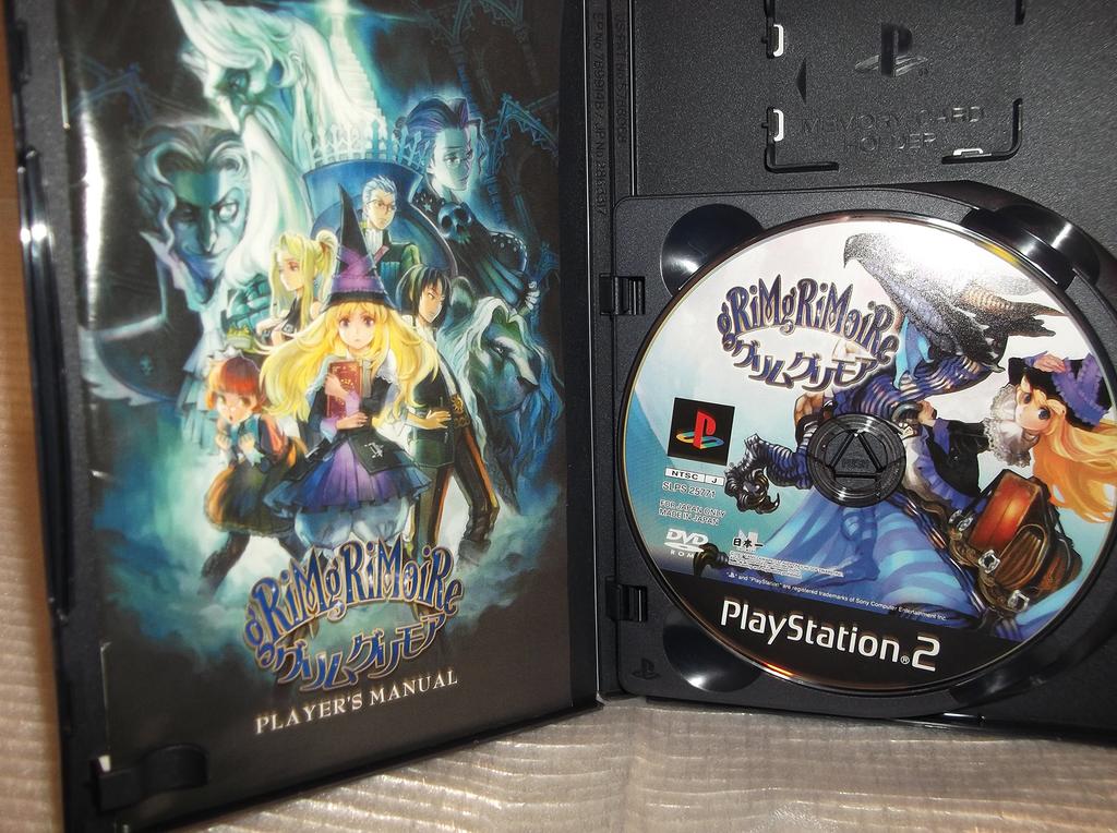 Grim Grimoire (First Edition: Includes Soundtrack CD Produced by Hitoshi Sakimoto)