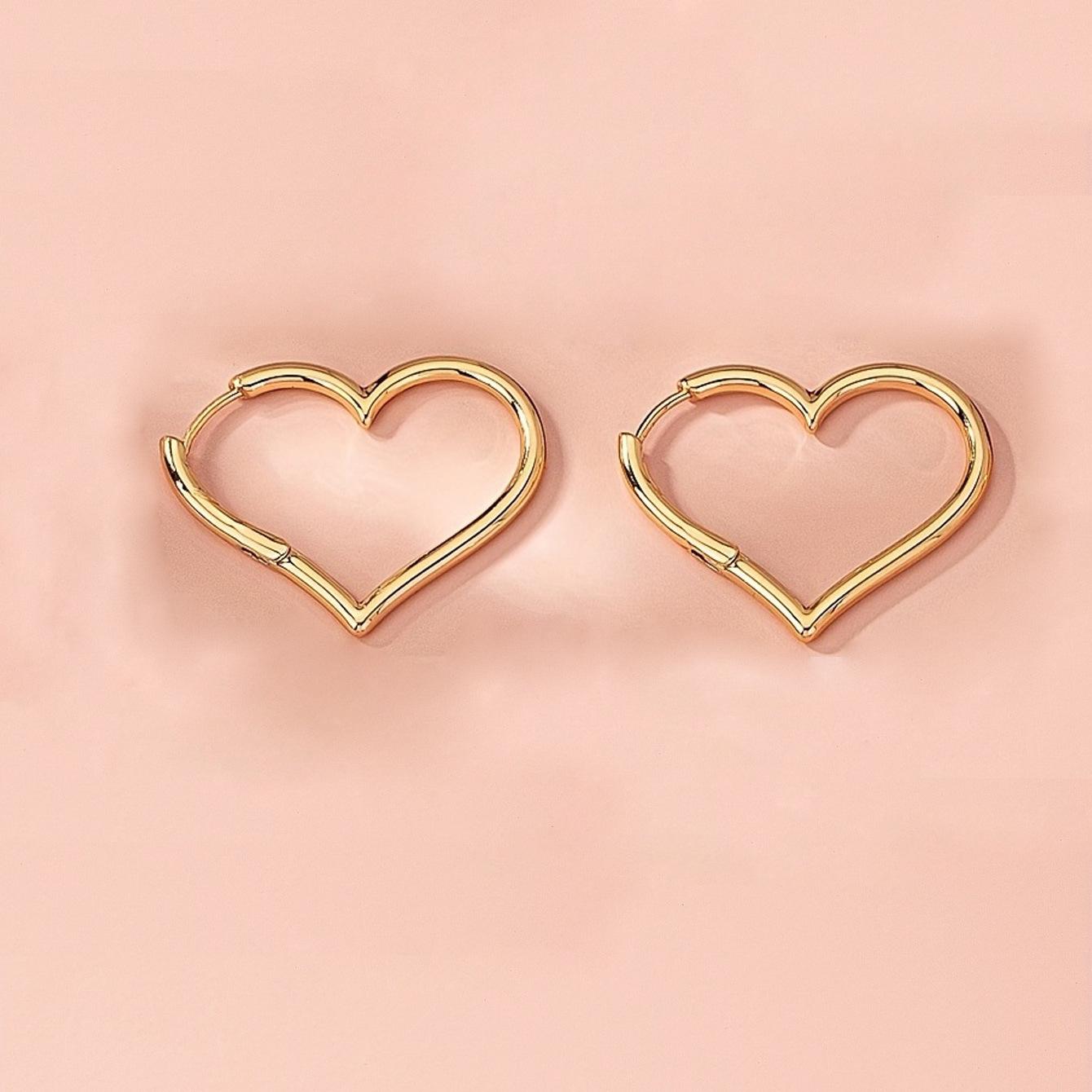 Серебряные простые серьги-подвески в форме буквы U