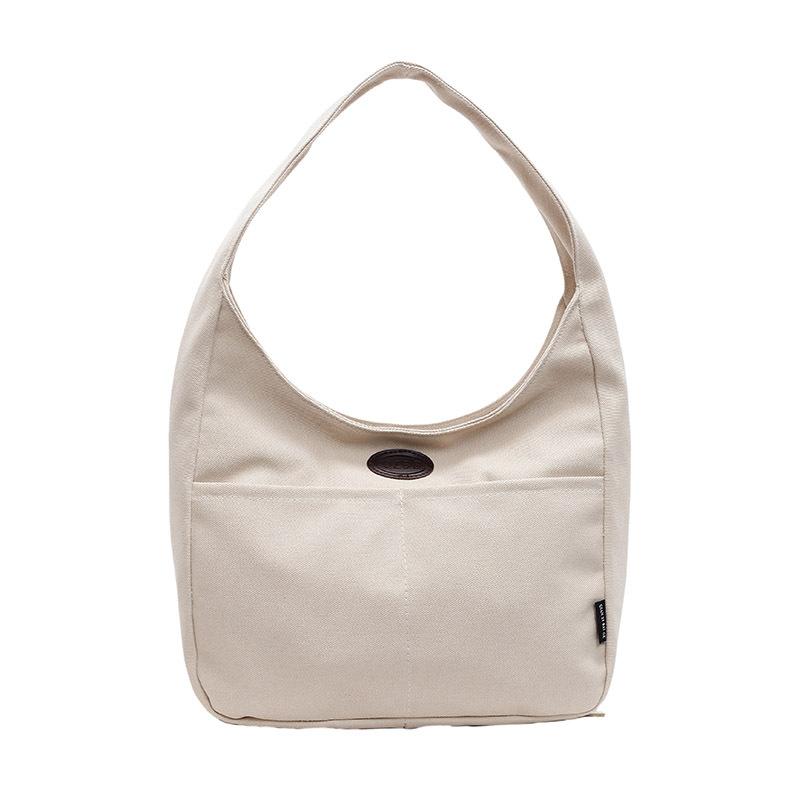 

A New Korean-style Fashionable and Versatile Casual Work and Commuting Handbag with A Large Capacity and Simple Fabric Bag 31*33*13