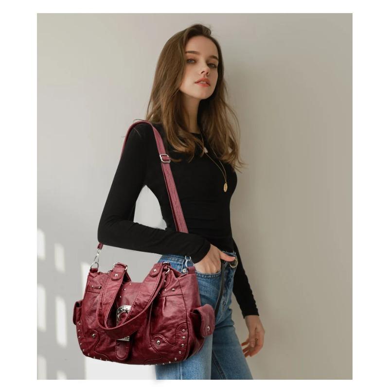 Stilvolle Lederhandtasche mit silbernen Nieten und Metallschnalle Damen Hohe Kapazität Vintage Weiches Leder Damen Lässige Schulter-Umhängetasche Reise