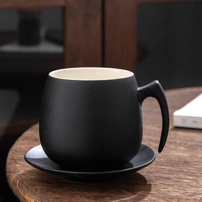 Tasse à café en céramique avec sous-verre