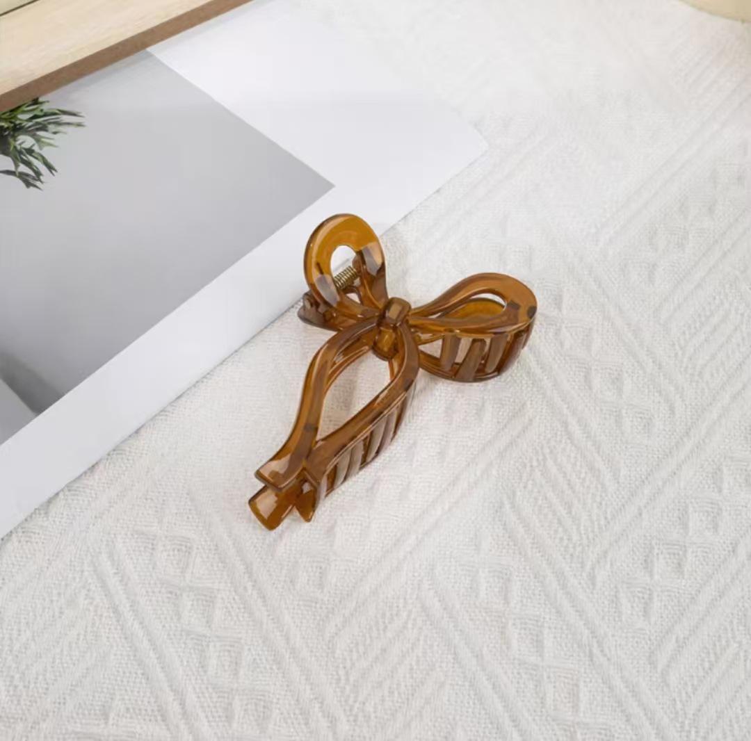 

Elegant Bow Claw Hair Clip - High-End Temperament Accessory for Influencers оранжевый