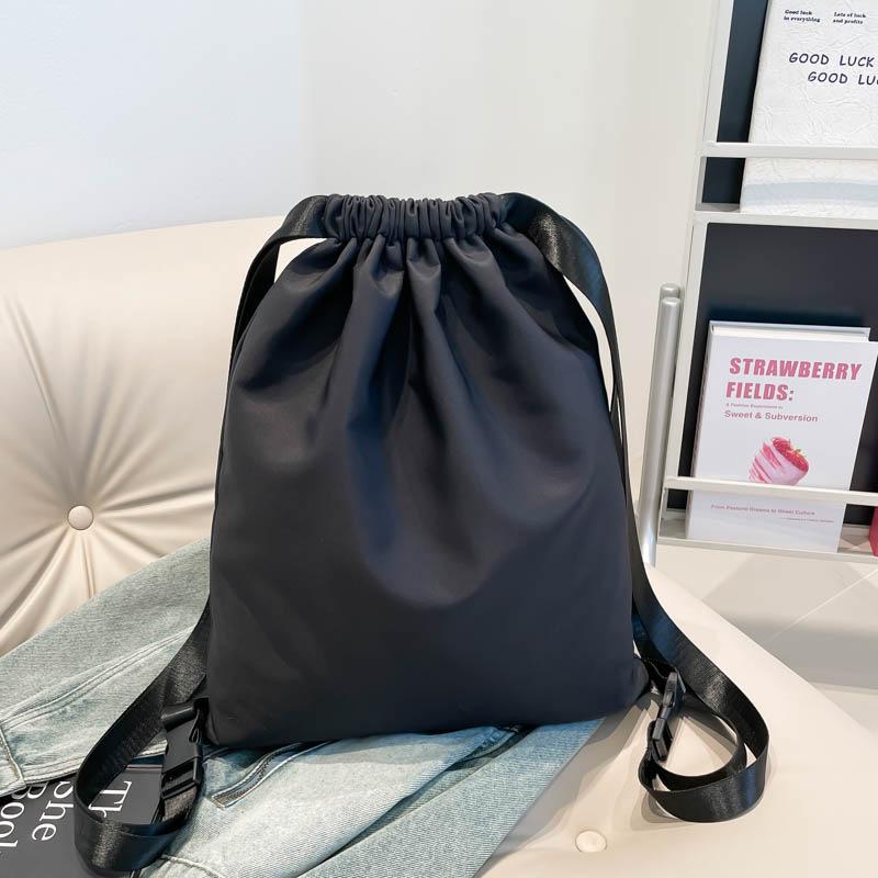 Schoolbag solid color Korean version drawstring retro versatile large capacity backpack female niche simple fashion personalized backpack