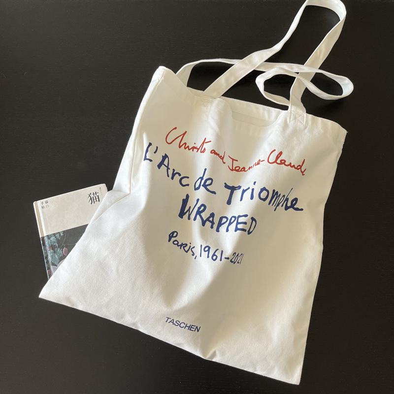 

Niche ins canvas bag red and blue letters cotton environmental protection bag Arc de Triomphe periphery Taschen grey cloth bag shoulder bag