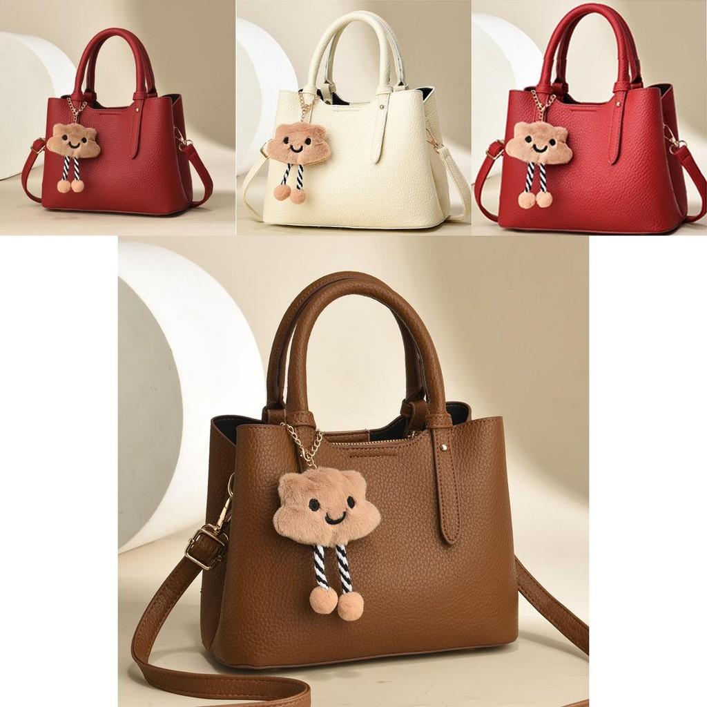 Classy Pu Handbag With Trendy Stone Texture And Ample Room For Daily Essentials