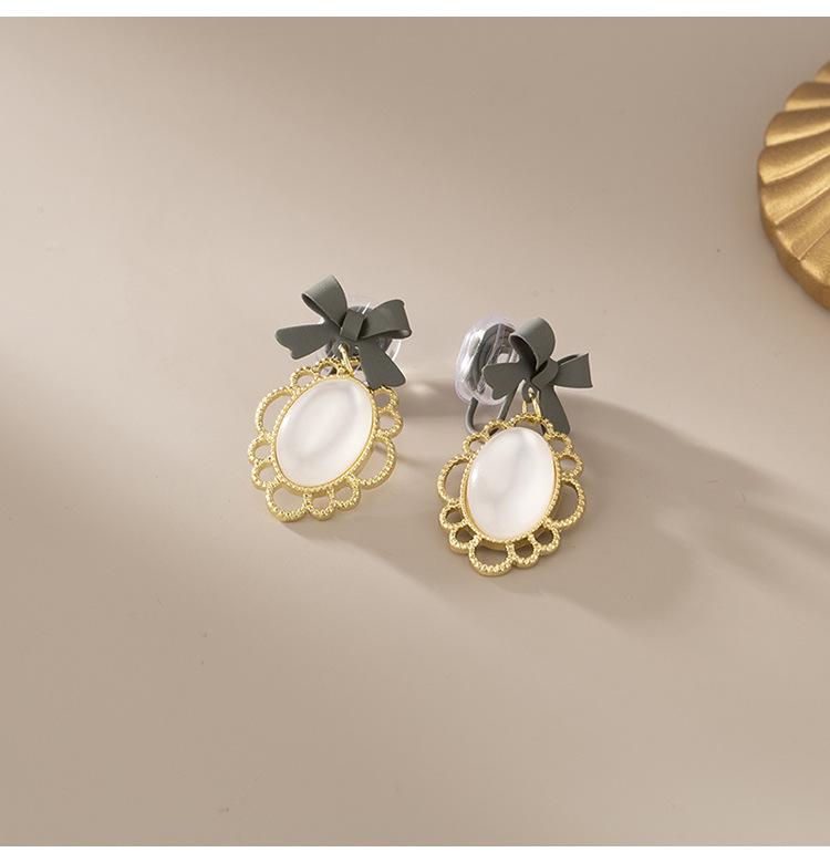 

Модные серьги с бантом, подвеска «кошачий глаз», длинный элегантный зажим для ушей в виде противомоскитной катушки, без отверстий для ушей