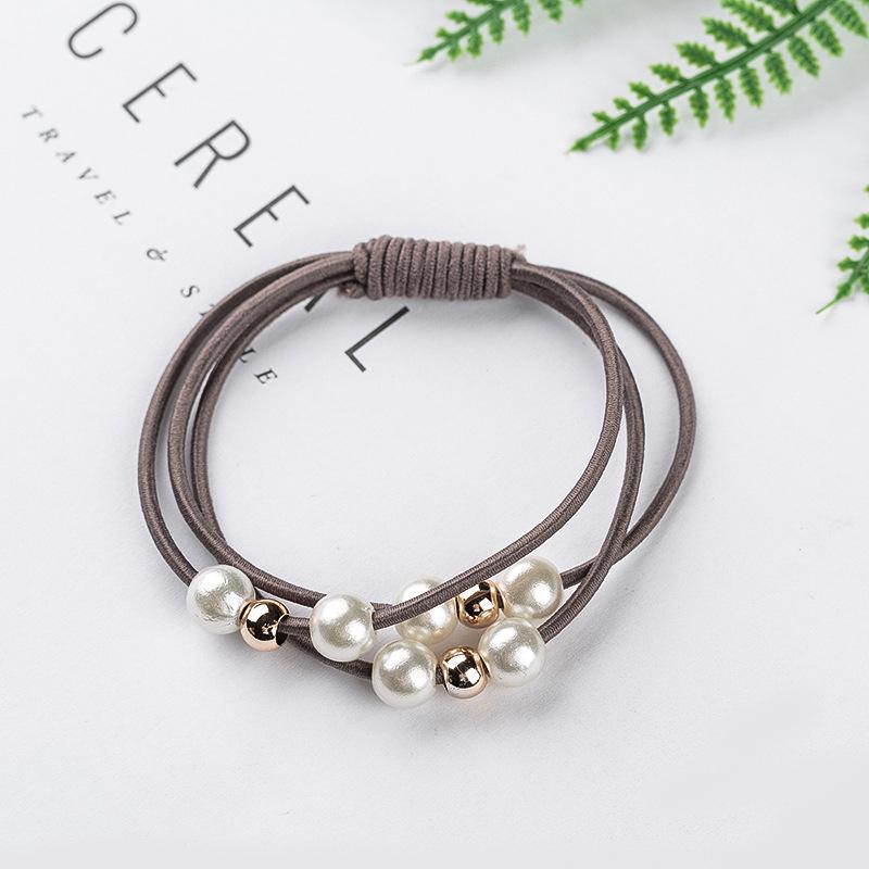 

Эластичные резиновые ленточки украшенные жемчугом коричневый