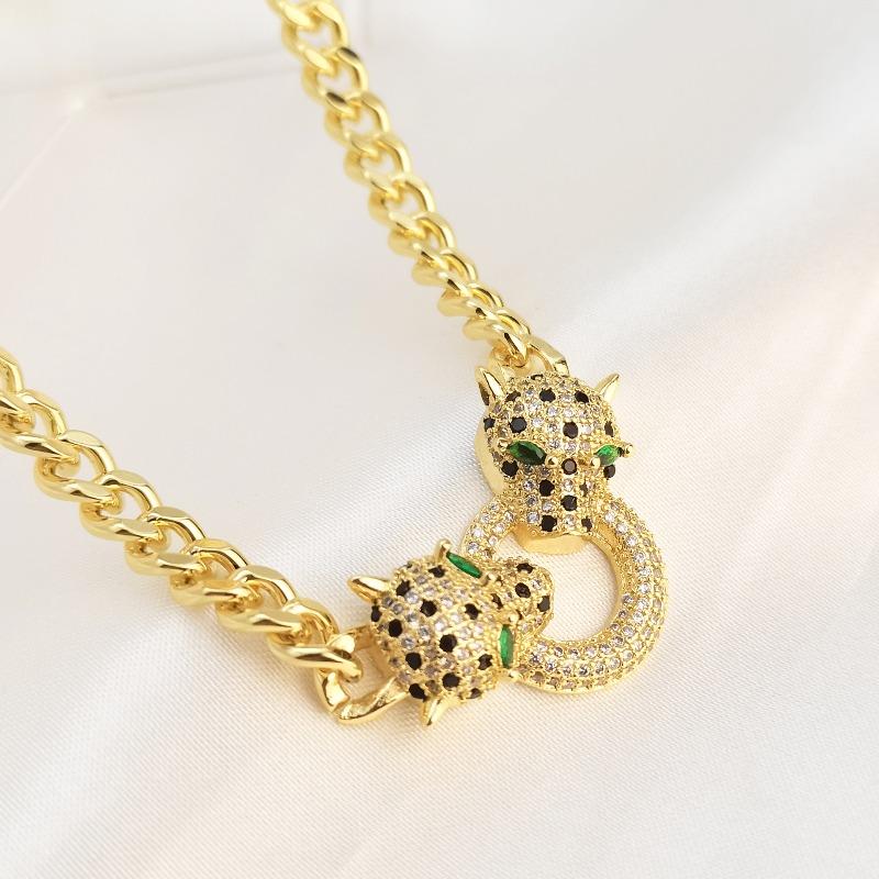 

Copper micro-paved zircon necklace, real gold electroplated exaggerated punk style double leopard head pendant necklace
