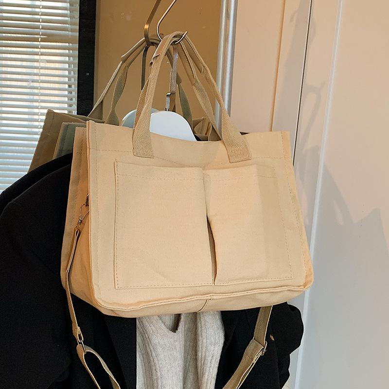 Large Capacity Commuting Tote Bag New Niche Canvas Bag Women's Retro One-shoulder Handbag Simple Crossbody Bag