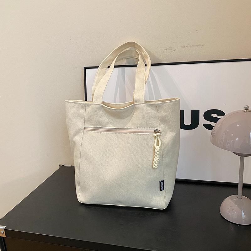 

Стильная простая однотонная ретро холщовая женская сумка новая универсальная портативная сумка-тоут повседневная на плечо подмышку one size fits all белый