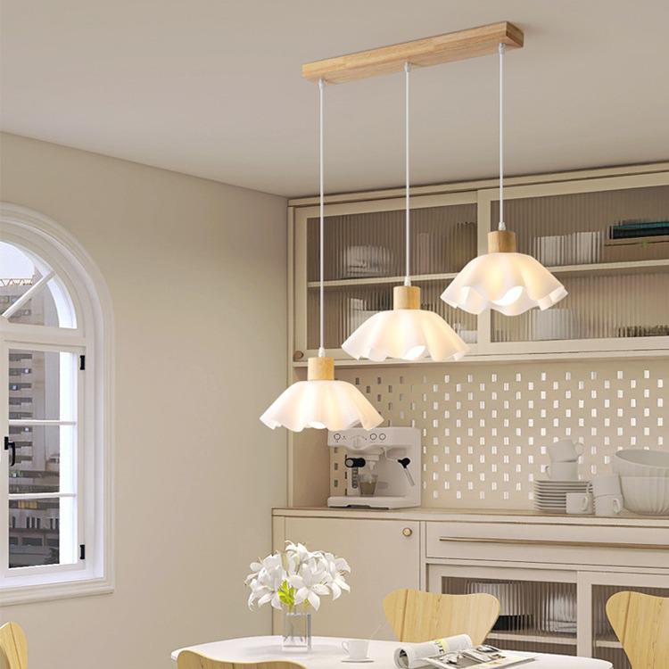 Nordic Modern Wood Art Light: Three-Head Dining Table and Bedroom Lamp in Japanese Wabi-Sabi Style.