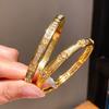 Vintage Floral Copper Bracelet With Zirconia Stones For Elegant Hand Jewelry