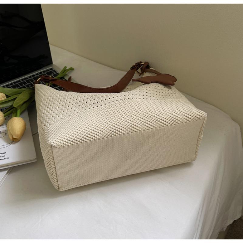 Summer lazy wind large-capacity tote bag women's new niche light luxury hand-woven underarm bag beach bag