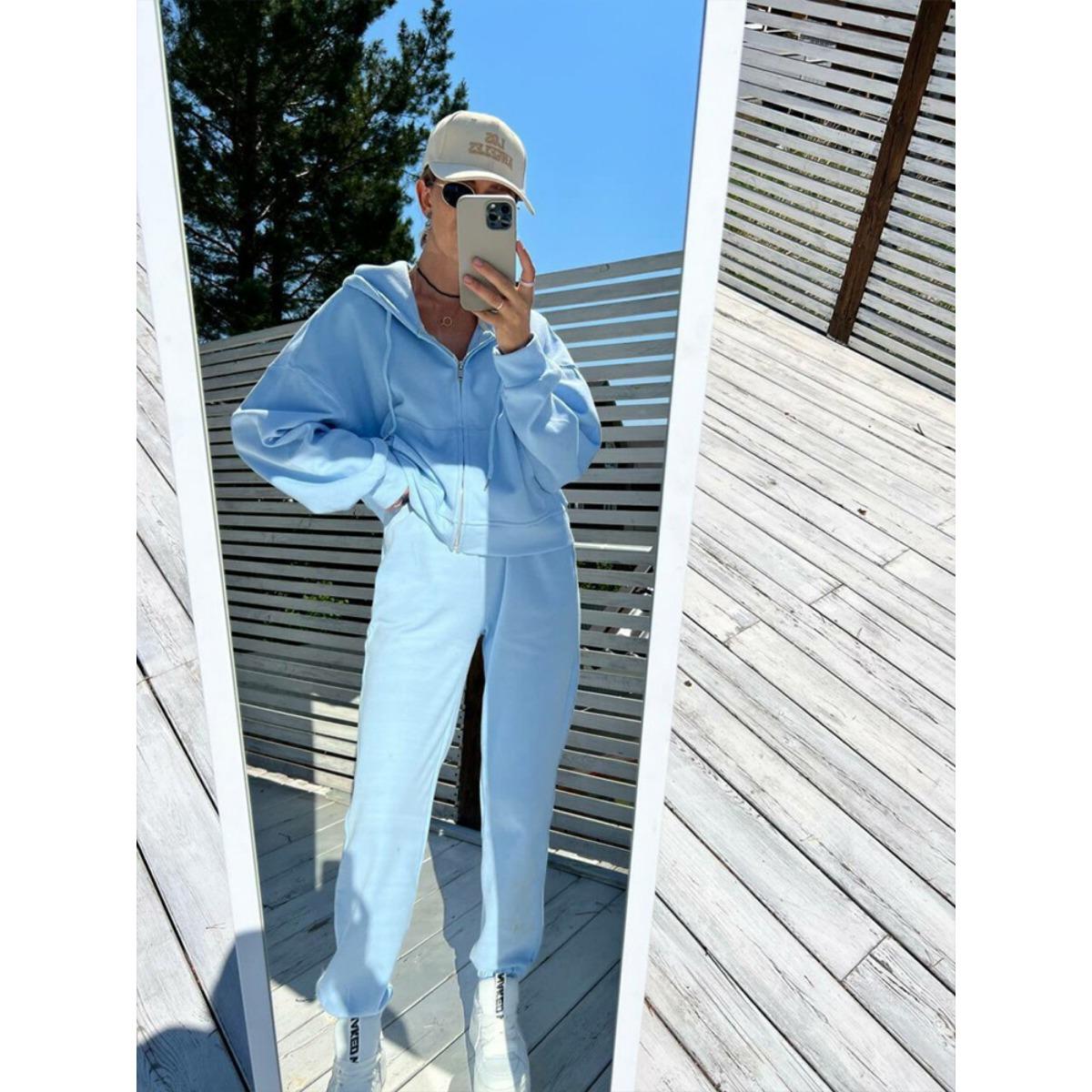 

Повсякденний жіночий комплект однотонний худі на блискавці з довгим рукавом штани на резинці комплект з двох предметів XL небо синє кольору