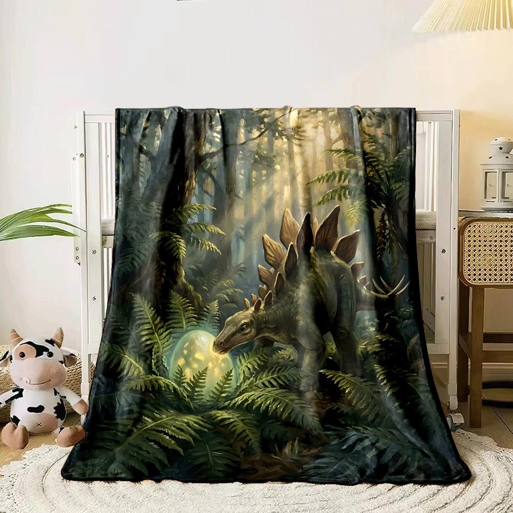 A Stegosaurus In a Lush Forest Examines a Glowing Egg Among Ferns. for All Seasons Blanket Lunch Break Throw Gift