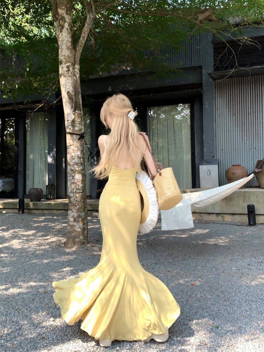 

Yellow French suspender dress women s summer pure desire skirt high-end sense step by step lotus fish tail hip wrap dress S жёлтый