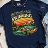Vintage Swimming Tee: Classic Swimmer Scene - Pine Trees Mountains, Water Sports Shirt, Summer Vacation Style
