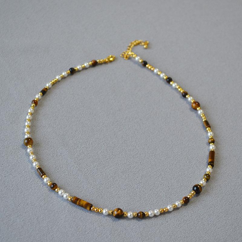 European and American niche retro Maillard wind tiger's eye stone pearl splicing beaded asymmetric necklace collarbone chain