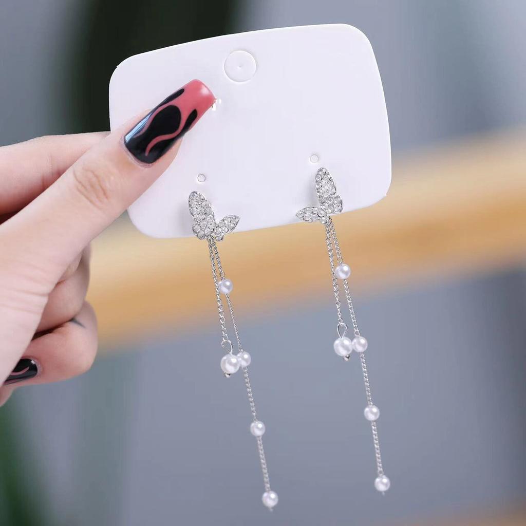 Pinkdudu Mode froid Style papillon longues boucles d'oreilles lumière luxe symétrique papillon frange boucle d'oreille pour les femmes PD1494