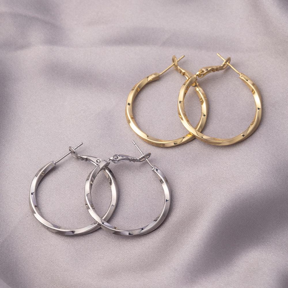 2025 Women's Möbius Hoop Earrings: Light Luxury & Nordic Retro Style