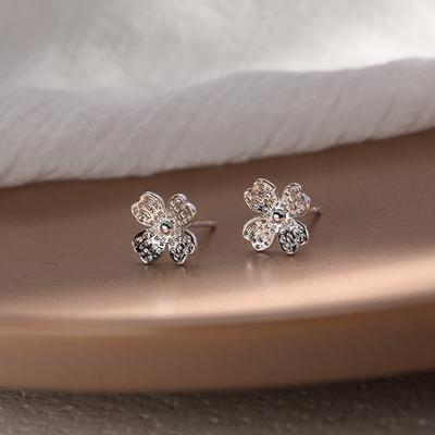 Four-leaf Flower Stud Earrings Female Rotating Shiny Lucky Flower Ear Jewelry Small Fresh Korean Version Niche Design Accessories