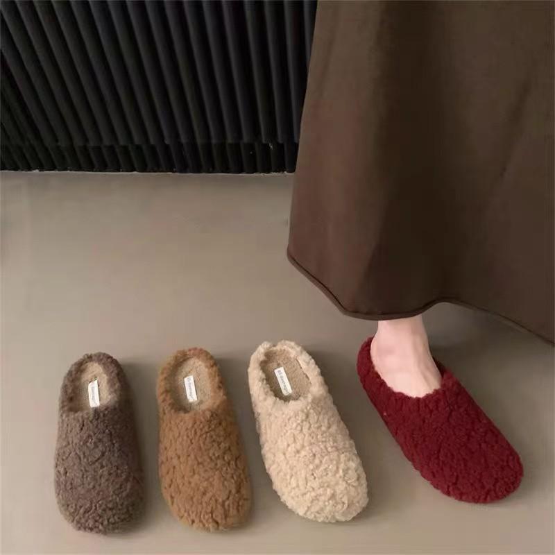 Lamb wool slippers women's wear 2025 new winter Korean version flat-bottomed lazy Muller shoes with velvet bag head half drag
