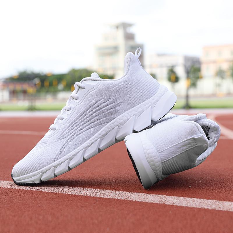 Fashion Spring Flying Knitted Breathable Running Shoes Sports Women Casual Shoes Soft Sole Couples Men And Women Small White Shoes