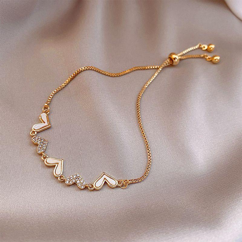 Koreanischer Stil Herz-Charms-Armband mit Zirkon-Verzierung für stilvolle Frauen