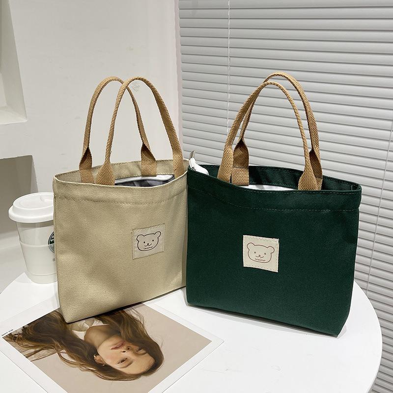 Women's bag niche design canvas tote bag hand carry bento bag mommy bag tote bag fashion trend canvas hand carry