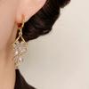 Copper-plated Real Gold Summer New Exquisite Fashion Super Flash Micro-inlaid Zircon Flower Fringed Ear Buckle Personalized Exaggerated Earrings