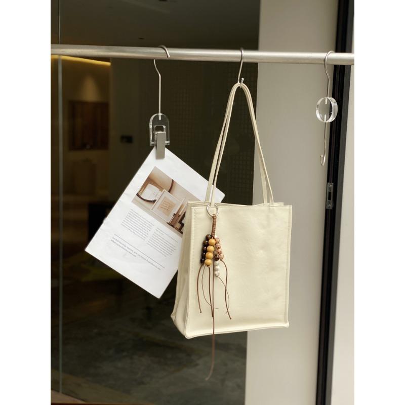 Top layer cowhide simple and versatile tote bag 2025 new commuter leather women's bag large capacity single-shoulder armpit bag