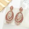 Chinese-Style Hollow Round Earrings: Bold, Stylish Design for Trendy Women